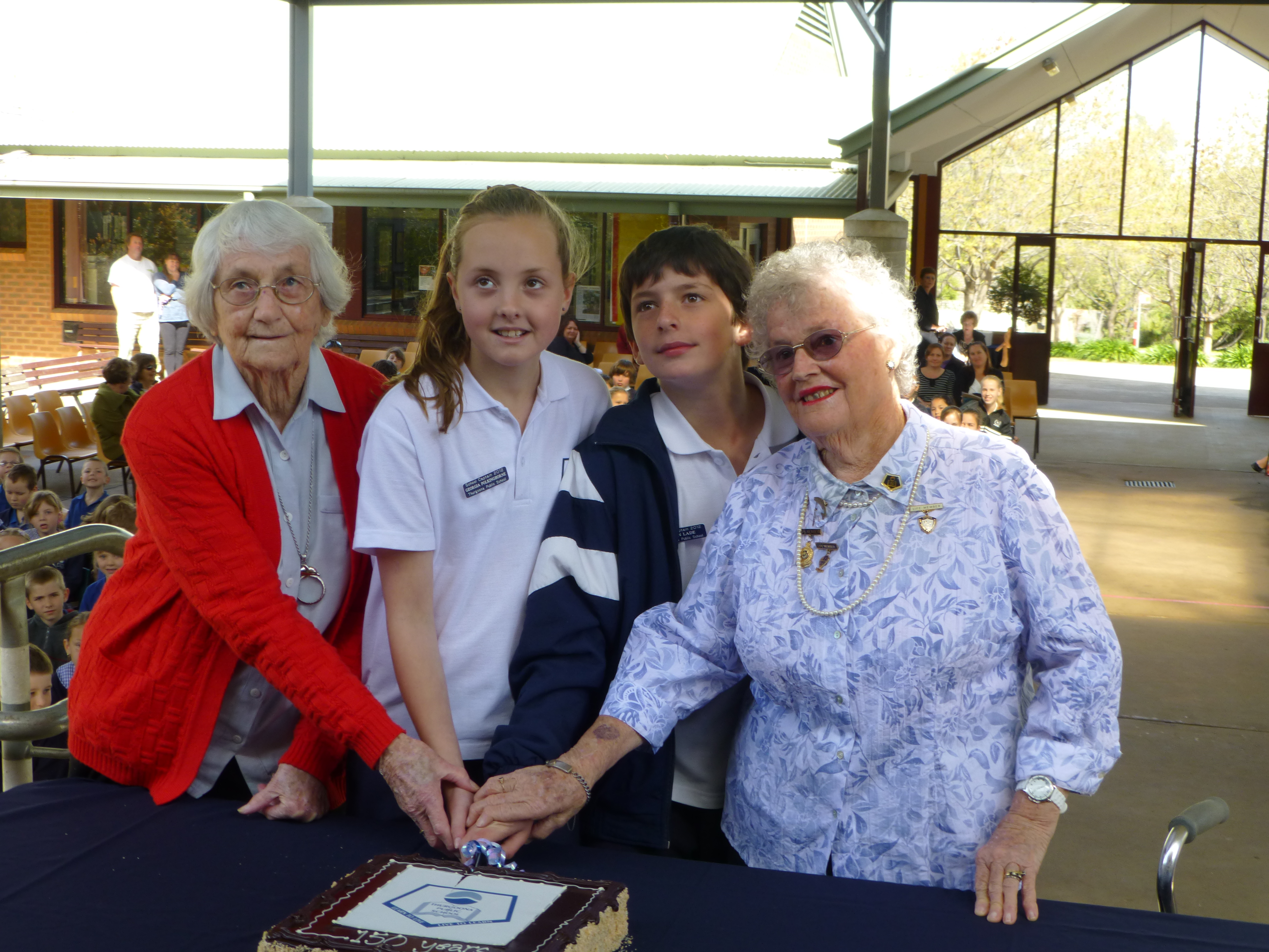 In 2012 Thurgoona Public School celebrated 150 years.  The school captains and some of the special guests cut  the 150 year cake.